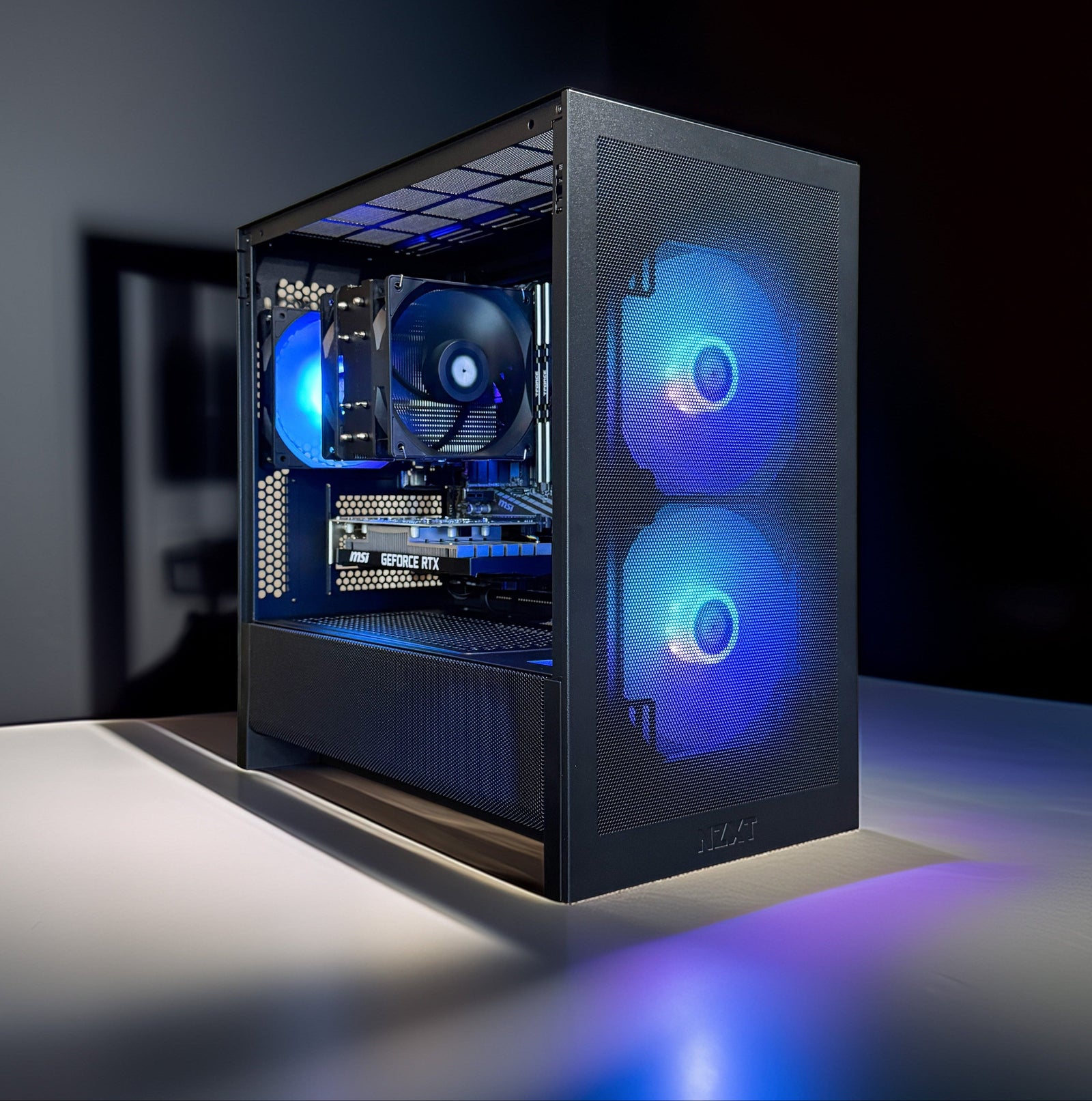 TWELF Onyx H3 SE black gaming PC with blue RGB fans