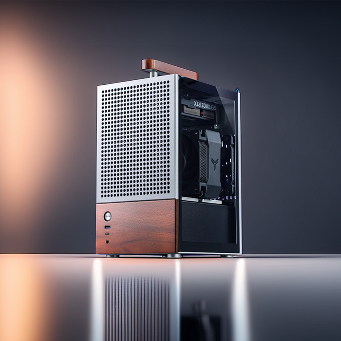Computer chassis with wooden front panel on a dark background